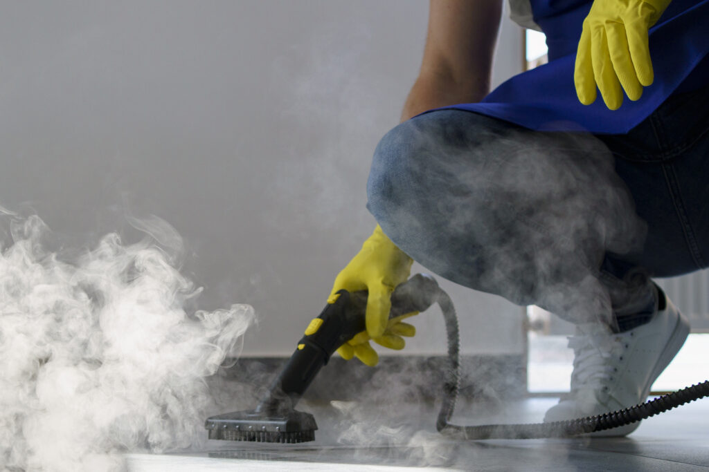 professional-cleaning-service-person-using-steam-cleaner-office (1)